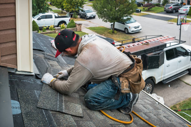 Professional Storm Damage Roof Repair technician working in Kersey, CO